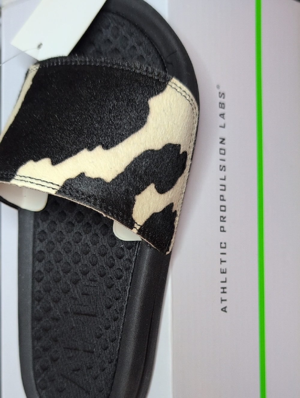 APL Cow Print Slide Sandal in Black and Cream
